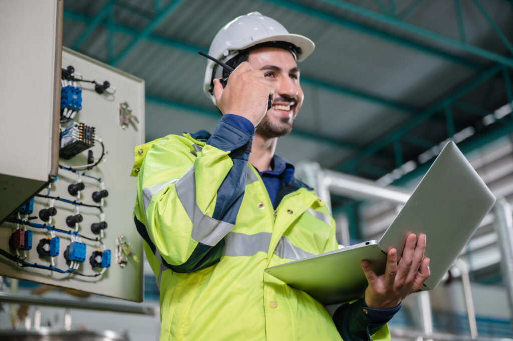 professional technician engineer working to control electrical power and safety service system, electrician working to maintenance and checking industrial equipment in term of factory technology